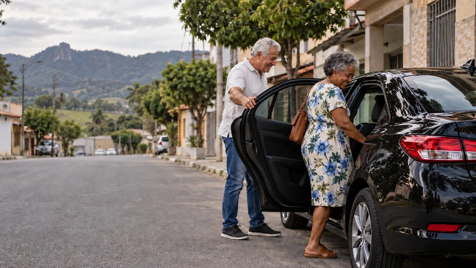 Casal entrando em um sedã preto